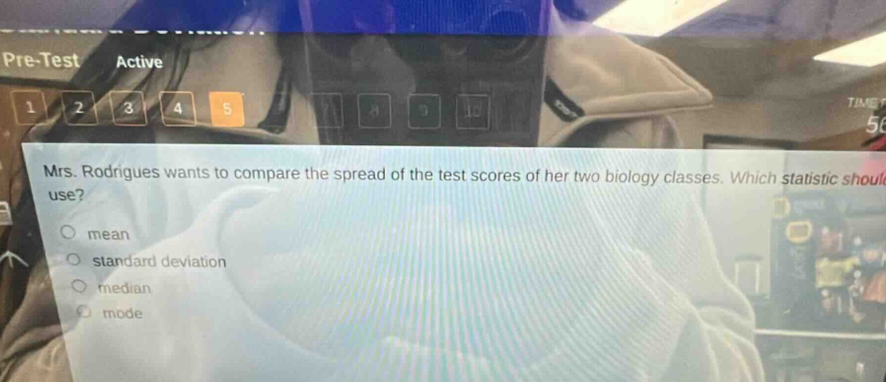mrs. rodrigues wants to compare the spread of the test scores of her two biology classes. which statistic should she use? mean standard deviation median mode
