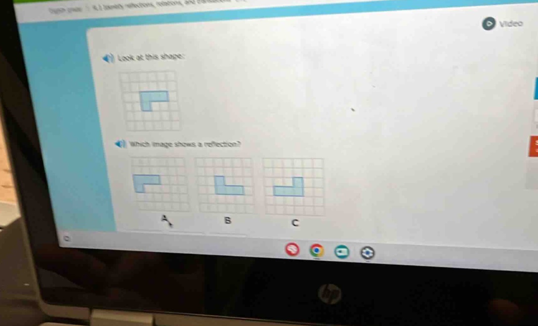 look at this shape: which image shows a reflection? a b c