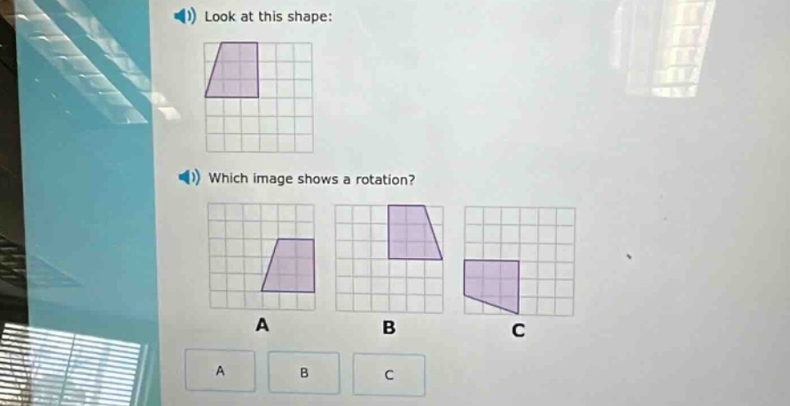 look at this shape: which image shows a rotation? a b c a b c