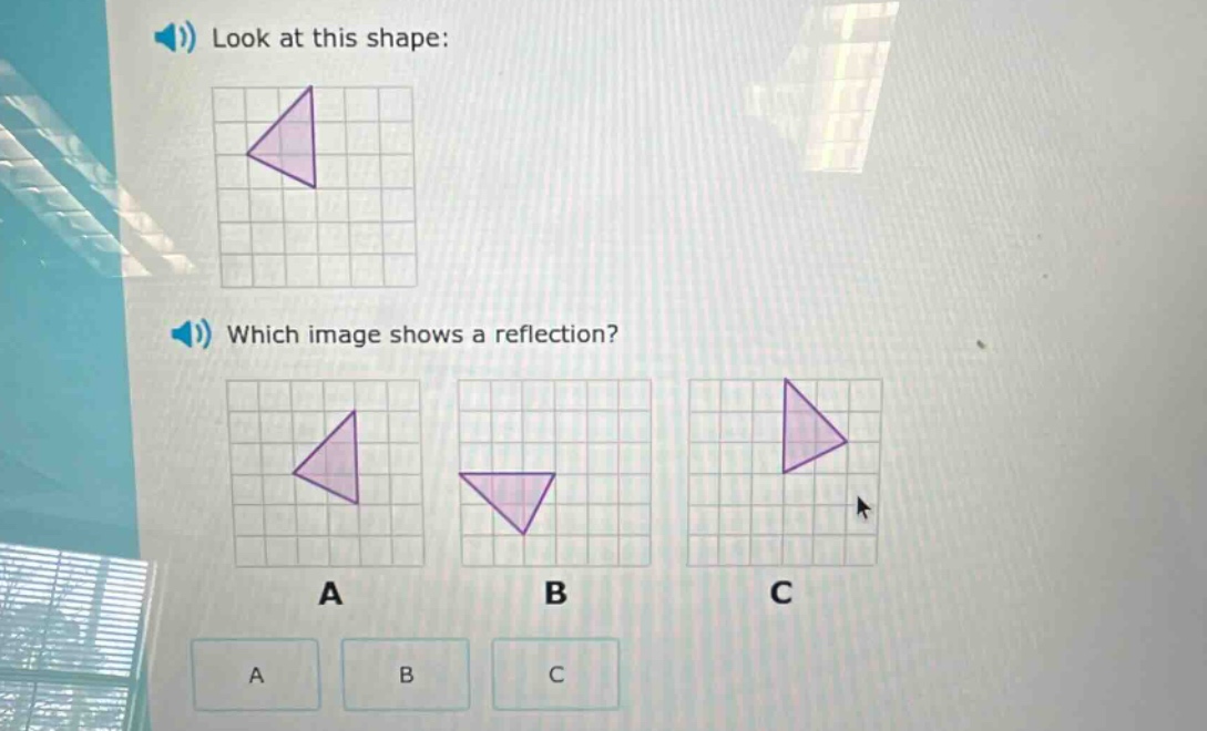 look at this shape: which image shows a reflection? a b c a b c