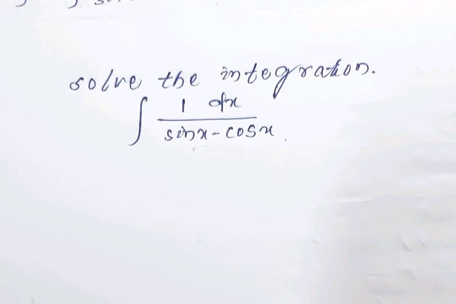 solve the integration. ∫ 1 dx / (sinx - cosx)