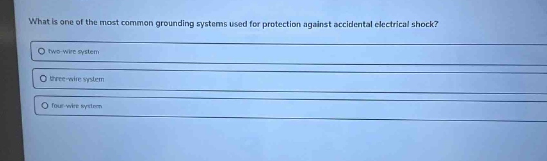 what is one of the most common grounding systems used for protection against accidental electrical shock?\no two - wire system\no three - wire system\no four - wire system