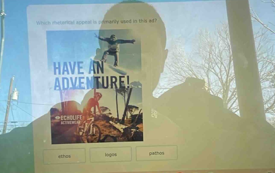 which rhetorical appeal is primarily used in this ad? have an adventure! echolife activewear ethos logos pathos