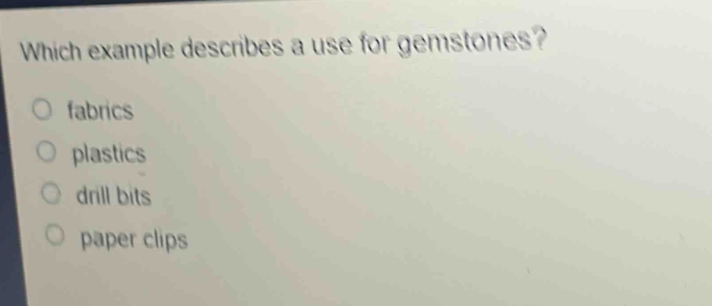 which example describes a use for gemstones? fabrics plastics drill bits paper clips