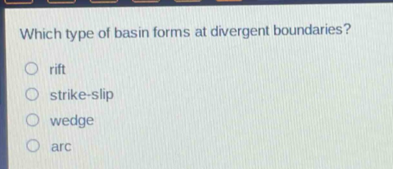 which type of basin forms at divergent boundaries?\nrift\nstrike - slip\nwedge\narc