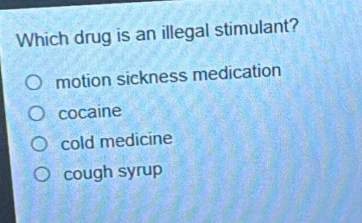 which drug is an illegal stimulant?\no motion sickness medication\no cocaine\no cold medicine\no cough syrup