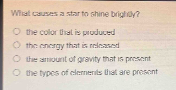 what causes a star to shine brightly? the color that is produced the energy that is released the amount of gravity that is present the types of elements that are present