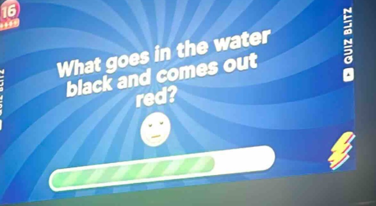 what goes in the water black and comes out red?
