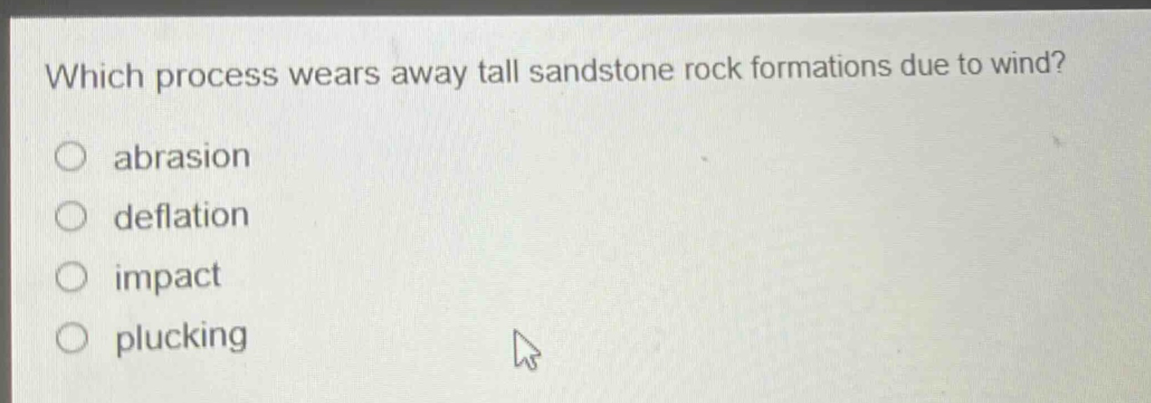 which process wears away tall sandstone rock formations due to wind? abrasion deflation impact plucking