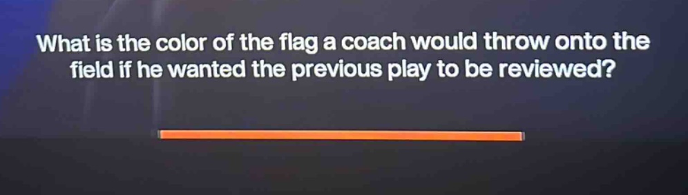 what is the color of the flag a coach would throw onto the field if he wanted the previous play to be reviewed?
