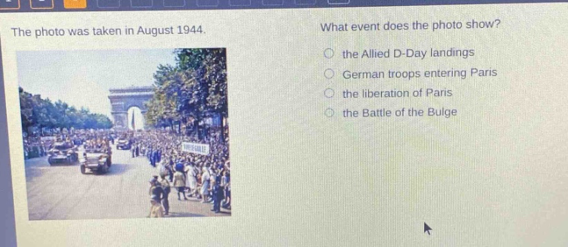 the photo was taken in august 1944. what event does the photo show? the allied d - day landings german troops entering paris the liberation of paris the battle of the bulge