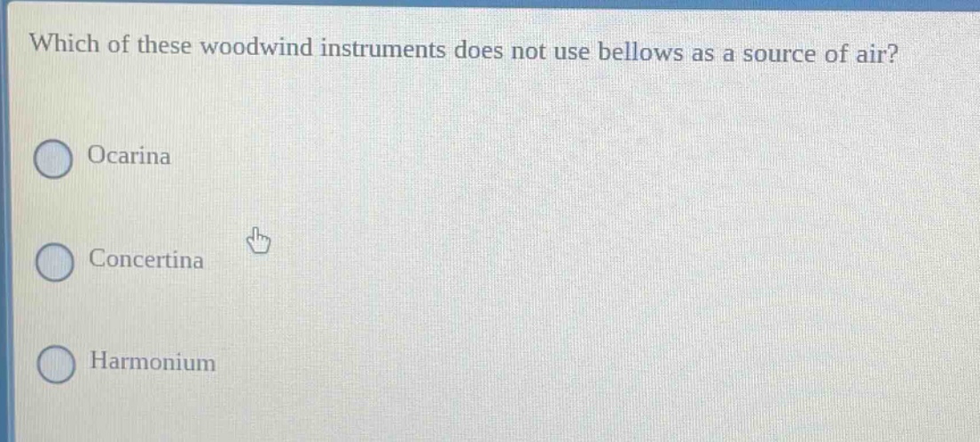 which of these woodwind instruments does not use bellows as a source of air? ocarina concertina harmonium
