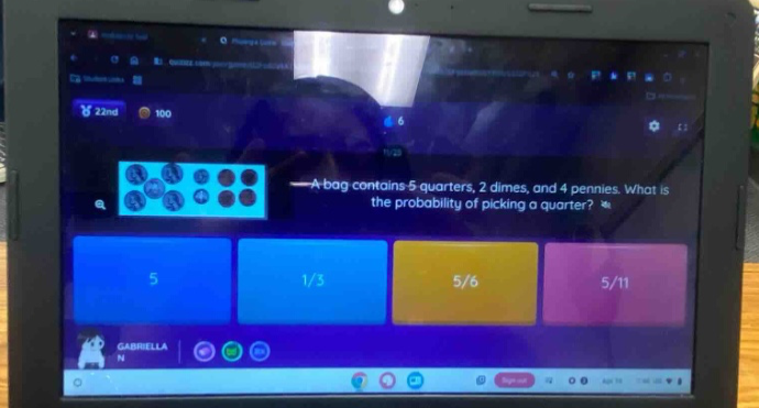 a bag contains 5 quarters, 2 dimes, and 4 pennies. what is the probability of picking a quarter?