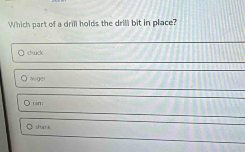 which part of a drill holds the drill bit in place?\nchuck\nauger\nram\nshank