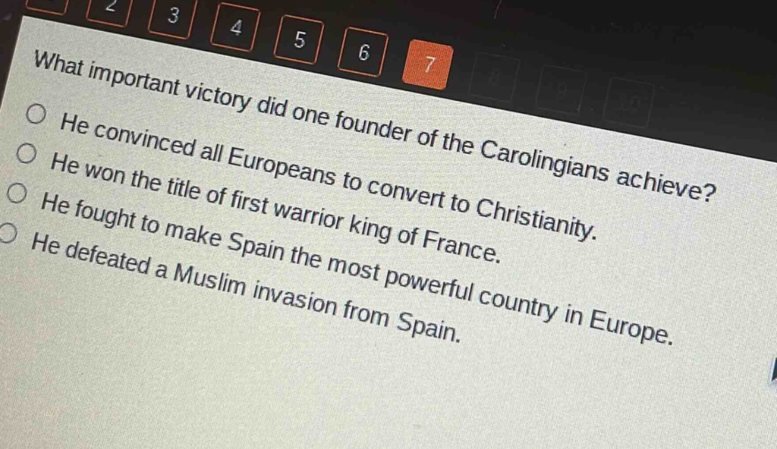 what important victory did one founder of the carolingians achieve?\nhe convinced all europeans to convert to christianity.\nhe won the title of first warrior king of france.\nhe fought to make spain the most powerful country in europe.\nhe defeated a muslim invasion from spain.