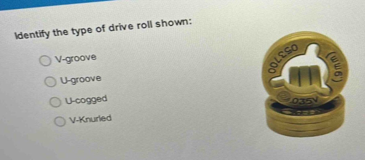 identify the type of drive roll shown:\nv - groove\nu - groove\nu - cogged\nv - knurled