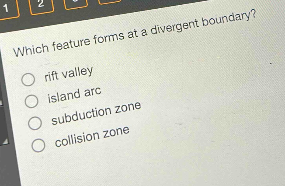 which feature forms at a divergent boundary?\nrift valley\nisland arc\nsubduction zone\ncollision zone