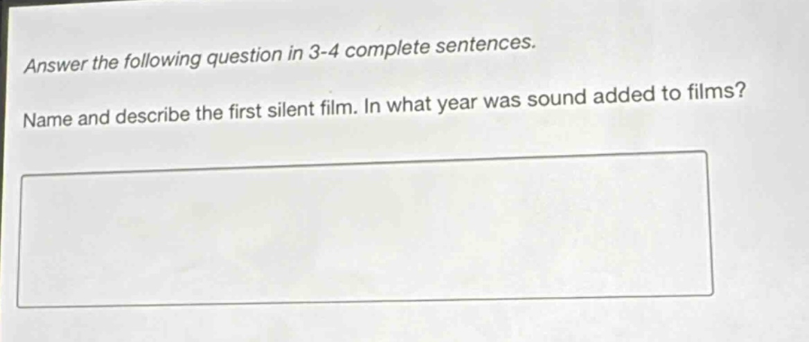 answer the following question in 3 - 4 complete sentences. name and describe the first silent film. in what year was sound added to films?