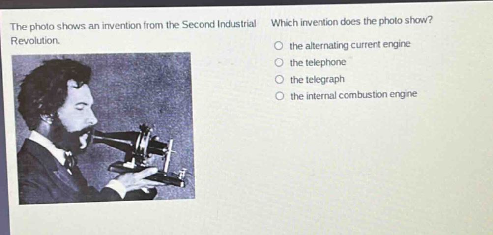 the photo shows an invention from the second industrial revolution. which invention does the photo show? the alternating current engine the telephone the telegraph the internal combustion engine