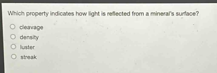 which property indicates how light is reflected from a minerals surface?\ncleavage\ndensity\nluster\nstreak