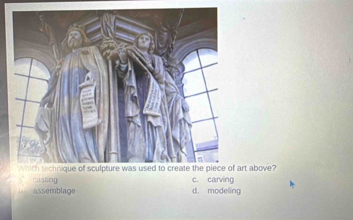which technique of sculpture was used to create the piece of art above? a. casting c. carving b. assemblage d. modeling