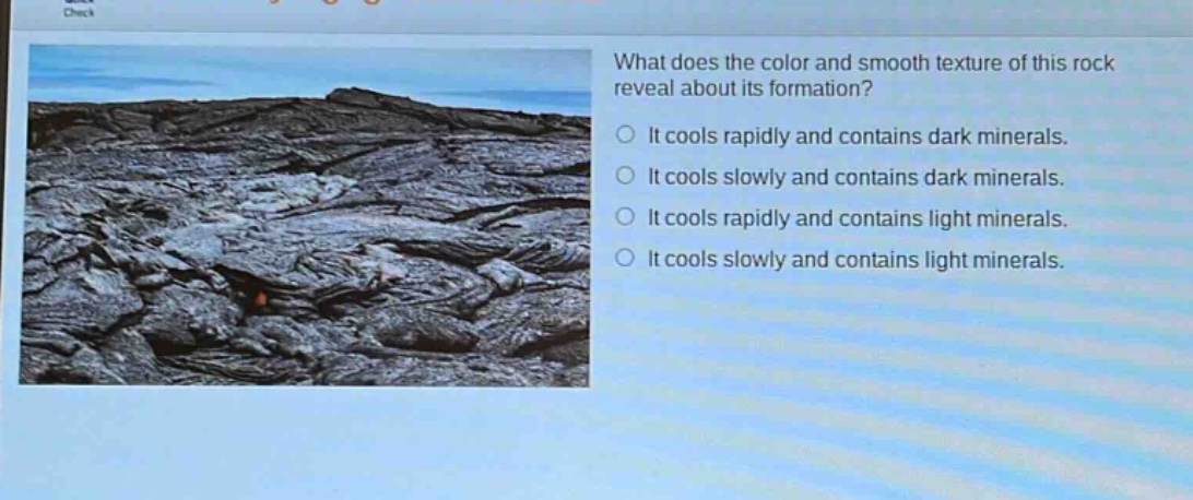 what does the color and smooth texture of this rock reveal about its formation? it cools rapidly and contains dark minerals. it cools slowly and contains dark minerals. it cools rapidly and contains light minerals. it cools slowly and contains light minerals.