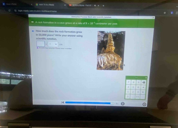 a rock formation in a cave grows at a rate of 9×10⁻³ centimeter per year. how much does the rock formation grow in 50,000 years? write your answer using scientific notation.