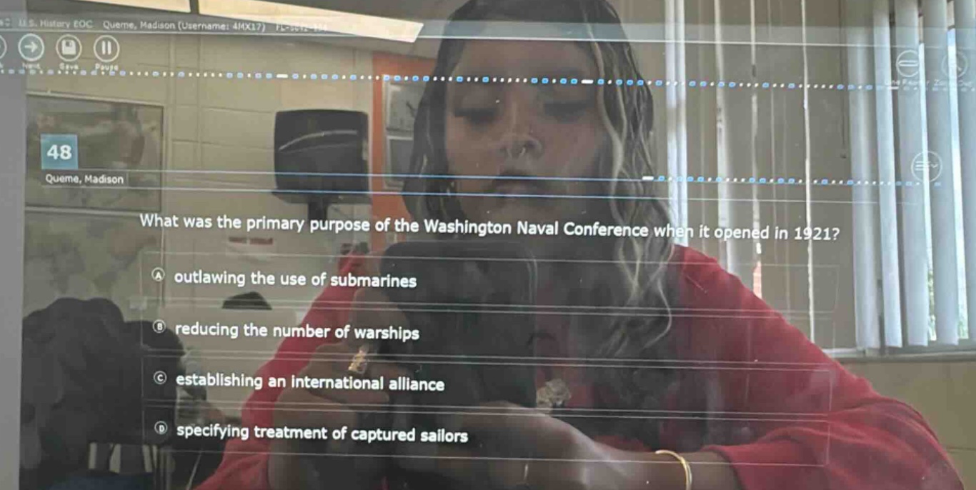what was the primary purpose of the washington naval conference when it opened in 1921?\na outlawing the use of submarines\nb reducing the number of warships\nc establishing an international alliance\nd specifying treatment of captured sailors