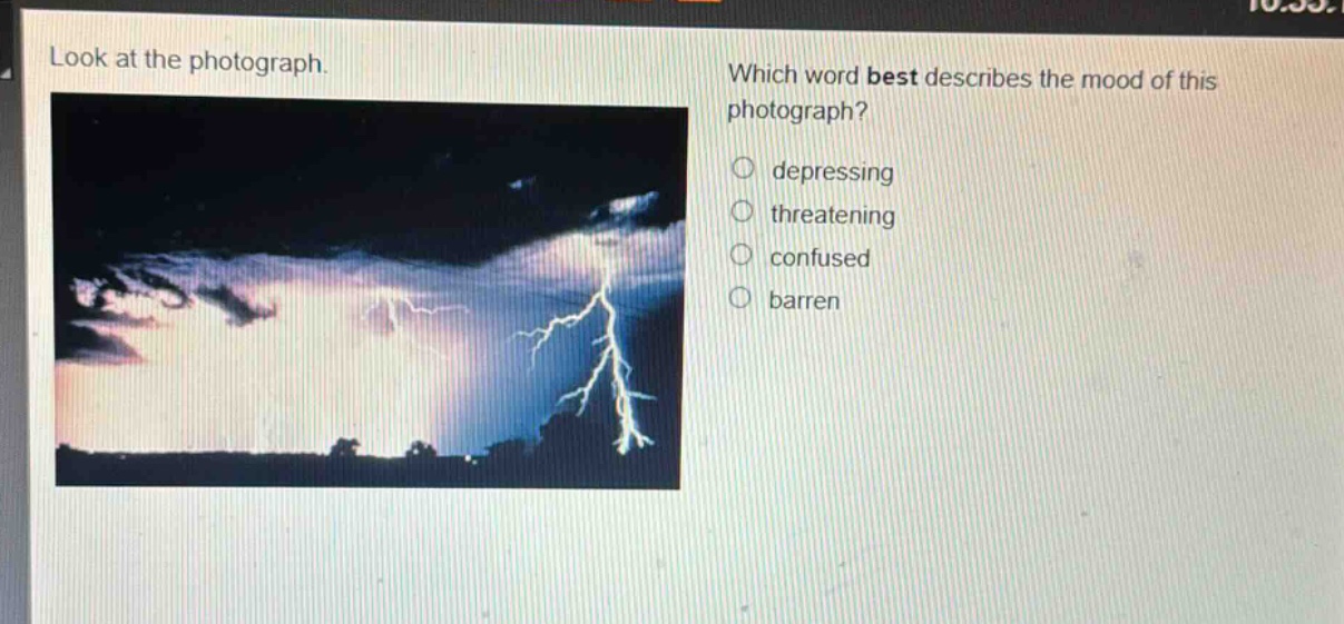 look at the photograph. which word best describes the mood of this photograph?\n○ depressing\n○ threatening\n○ confused\n○ barren