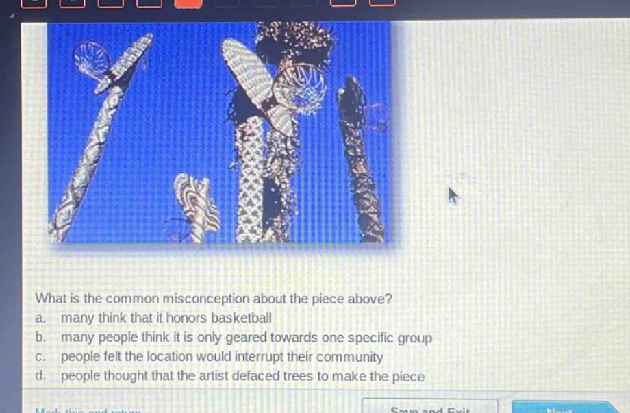 what is the common misconception about the piece above?\na. many think that it honors basketball\nb. many people think it is only geared towards one specific group\nc. people felt the location would interrupt their community\nd. people thought that the artist defaced trees to make the piece