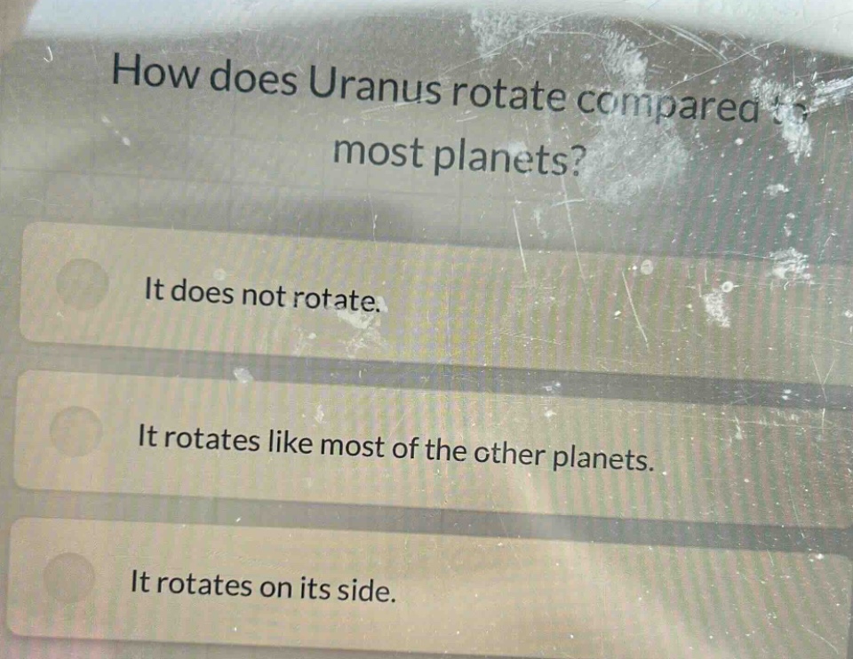 how does uranus rotate compared to most planets?\nit does not rotate.\nit rotates like most of the other planets.\nit rotates on its side.