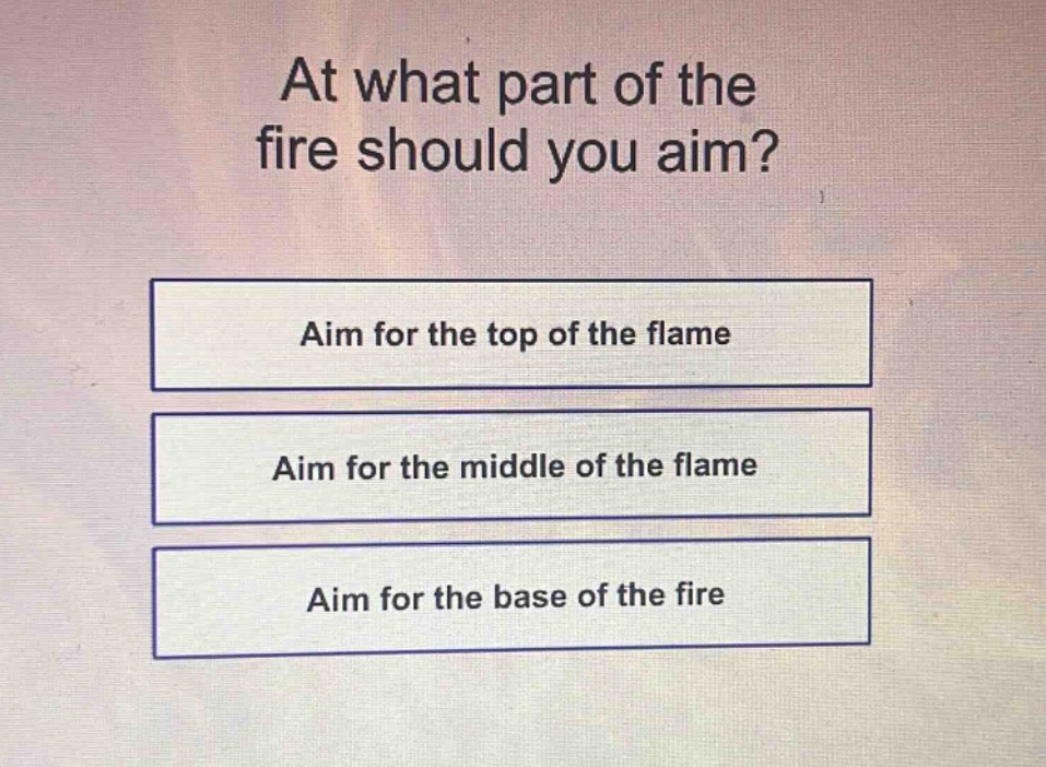 at what part of the fire should you aim?\naim for the top of the flame\naim for the middle of the flame\naim for the base of the fire