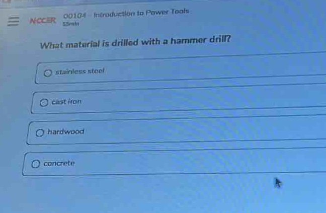 what material is drilled with a hammer drill?\nstainless steel\ncast iron\nhardwood\nconcrete