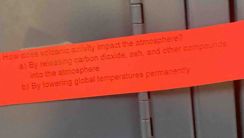 how does volcanic activity impact the atmosphere? a) by releasing carbon dioxide, ash, and other compounds into the atmosphere b) by lowering global temperatures permanently