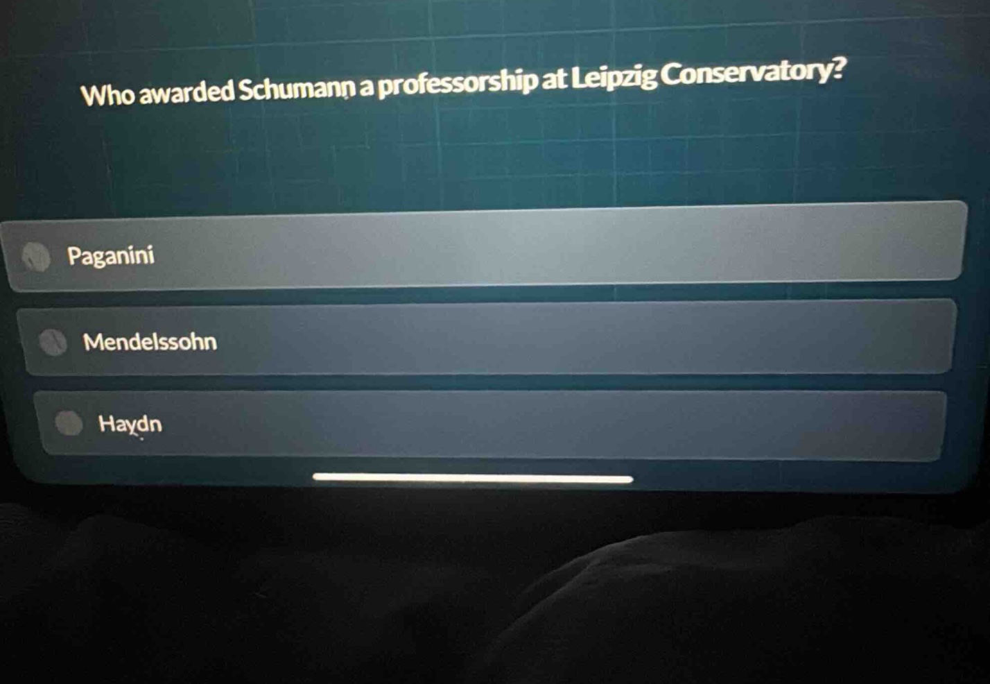who awarded schumann a professorship at leipzig conservatory?\npaganini\nmendelssohn\nhaydn