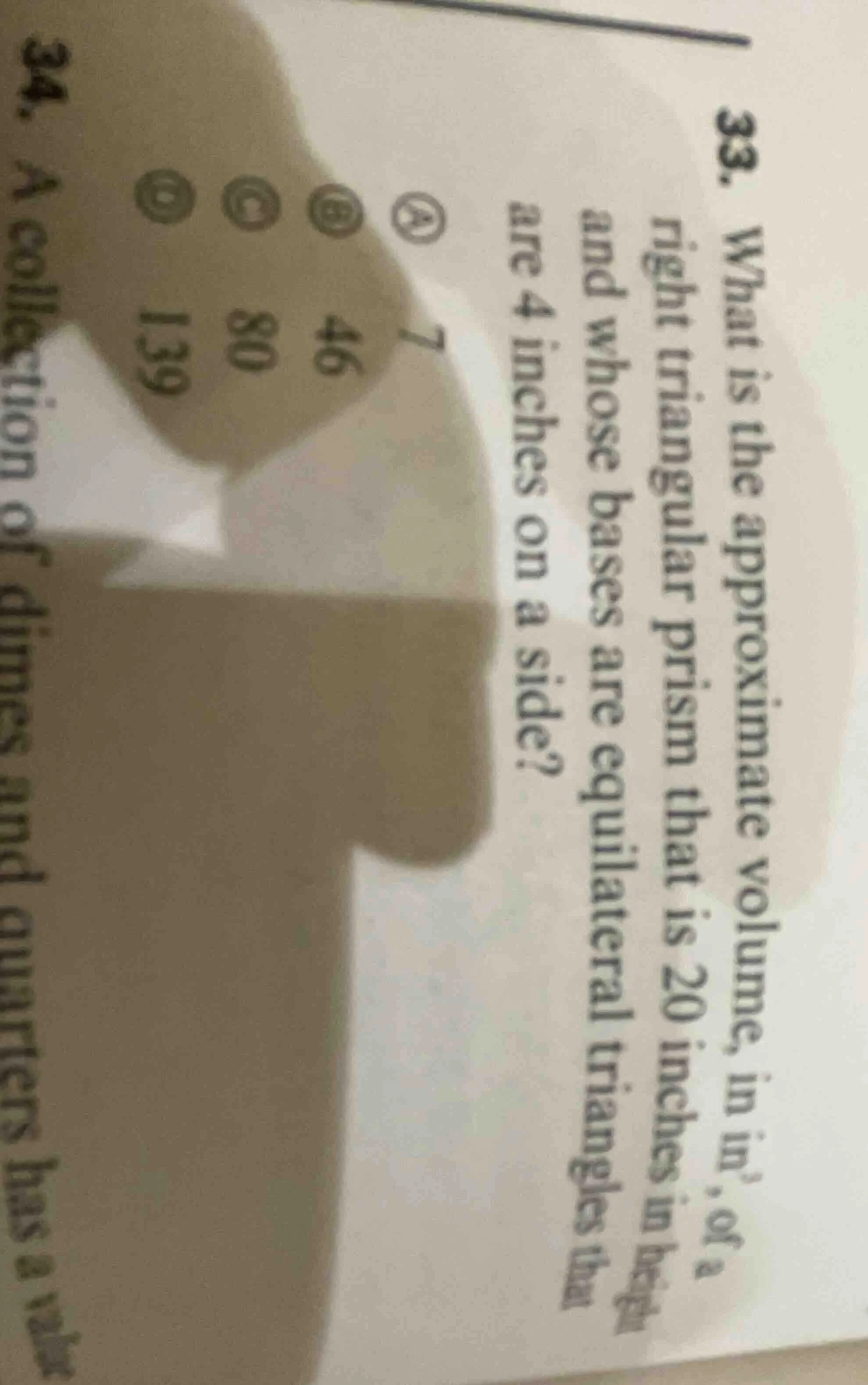33. what is the approximate volume, in in³, of a right triangular prism…