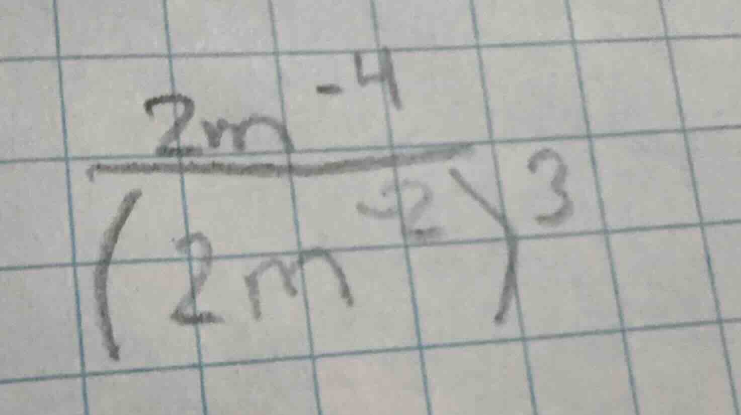 simplify the expression \\(\\frac{2m^{-4}}{(2m^{-2})^3}\\)