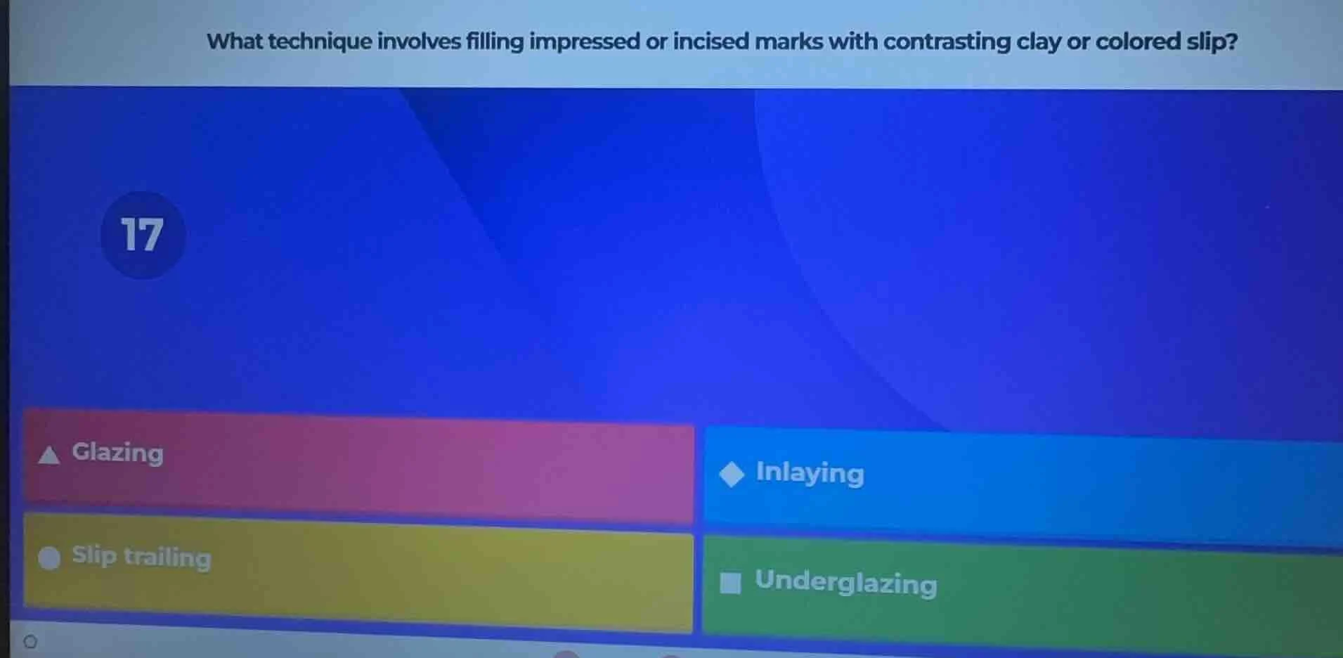what technique involves filling impressed or incised marks with contras…