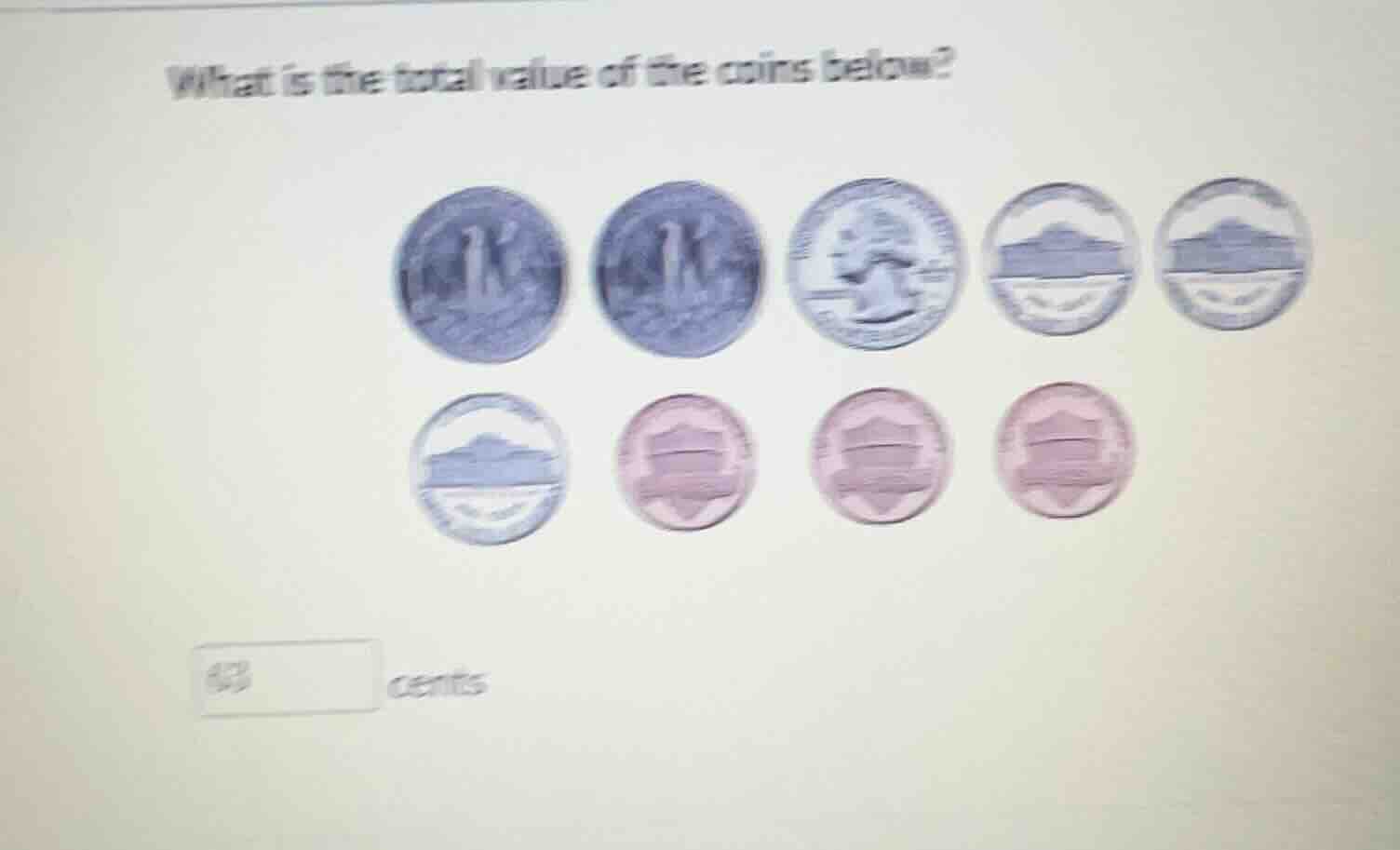 what is the total value of the coins below? (coins image) 63 cents