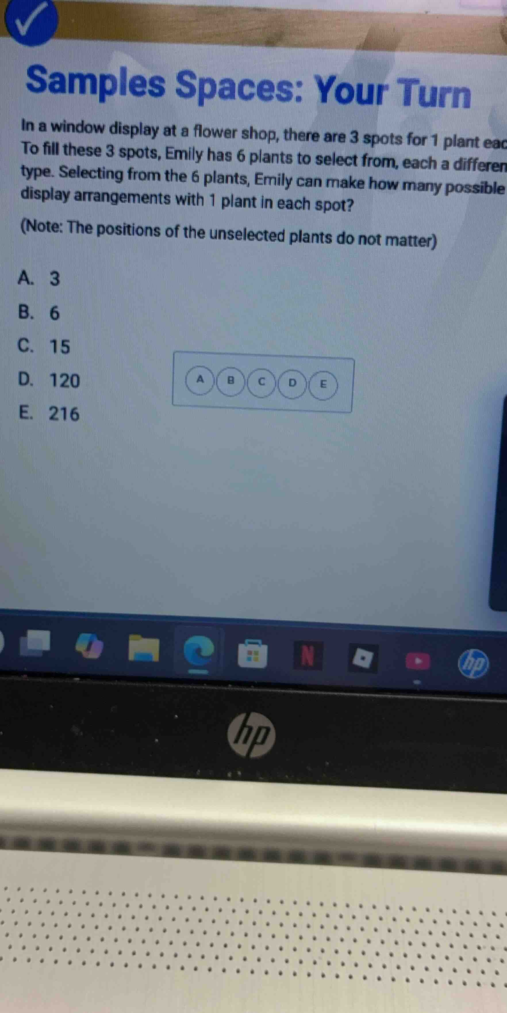 samples spaces: your turn in a window display at a flower shop, there a…