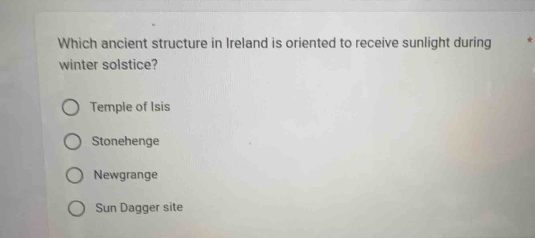 which ancient structure in ireland is oriented to receive sunlight duri…