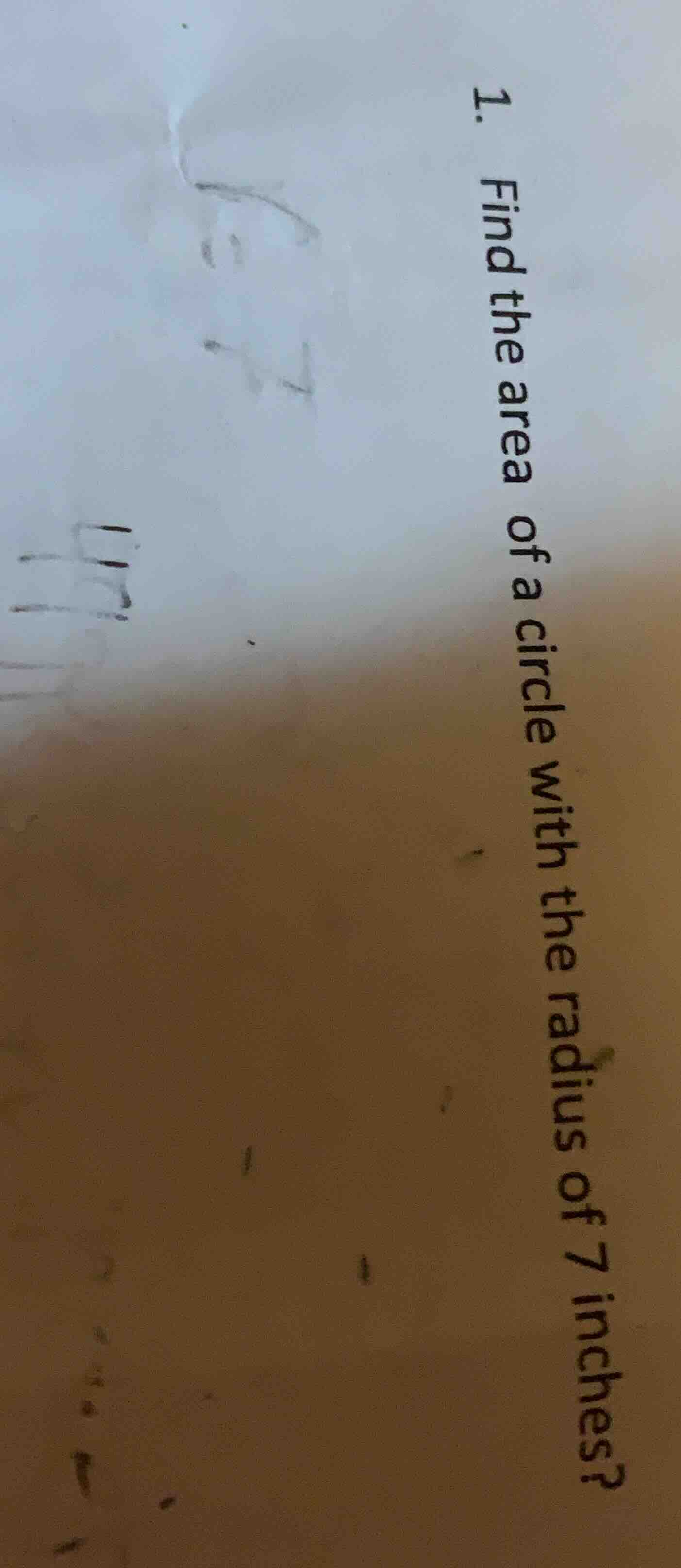 1. find the area of a circle with the radius of 7 inches?