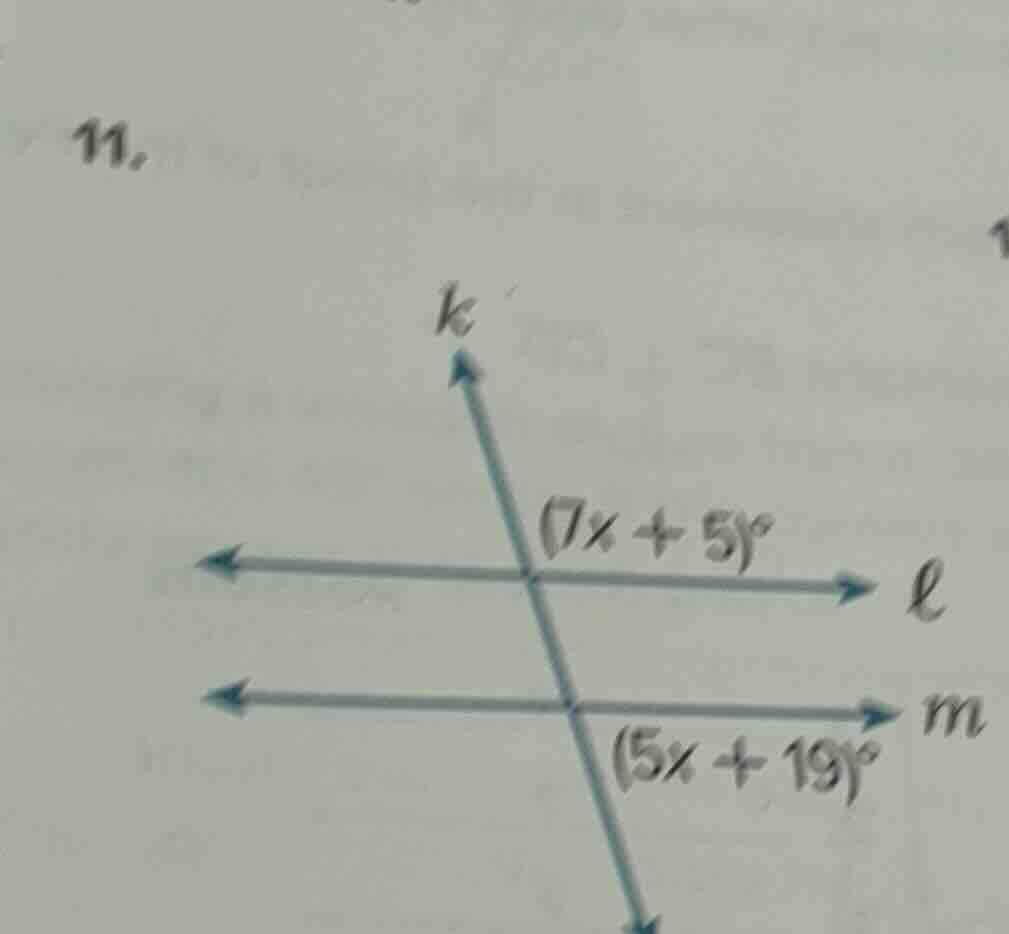 11. there is a diagram with three lines: line k (a transversal) interse…