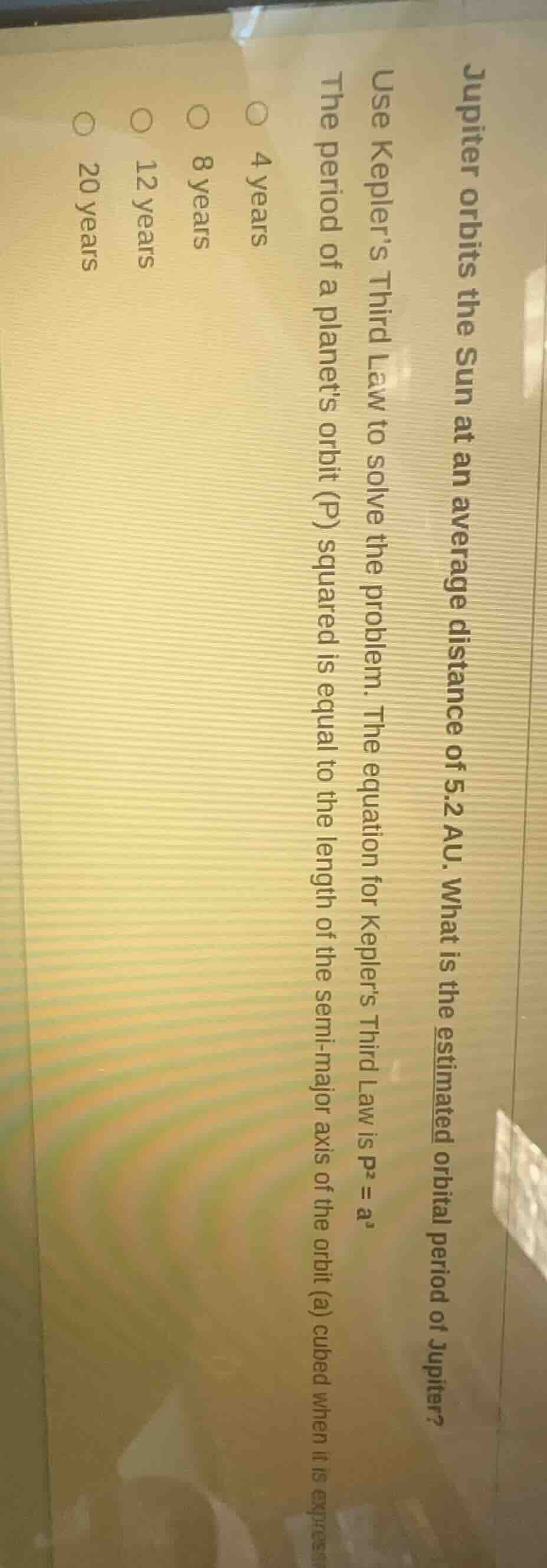 jupiter orbits the sun at an average distance of 5.2 au. what is the es…