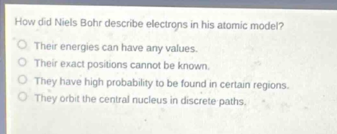 how did niels bohr describe electrons in his atomic model? their energi…