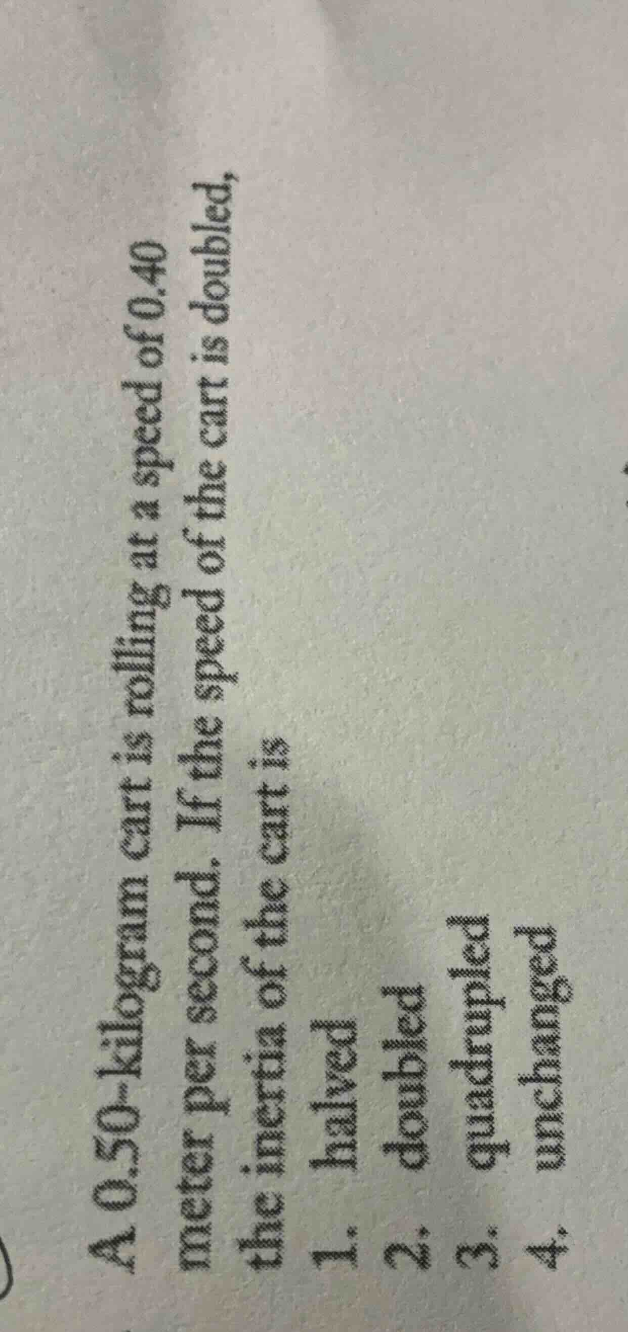 a 0.50 - kilogram cart is rolling at a speed of 0.40 meter per second. …