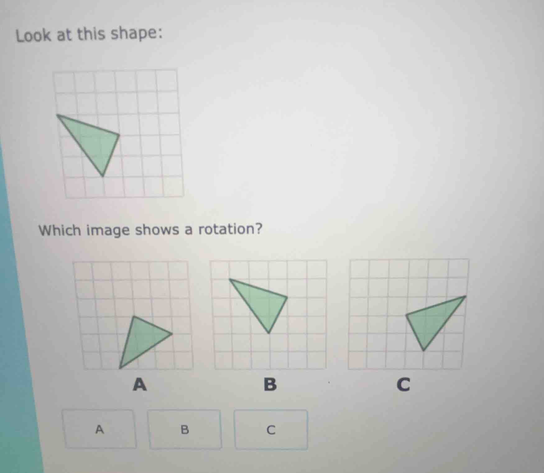 look at this shape: image of a green triangle on a grid which image sho…