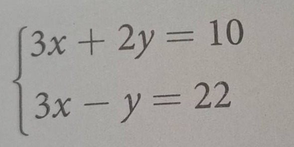 solve the system of equations \\(\\begin{cases} 3x + 2y = 10 \\\\ 3x - …