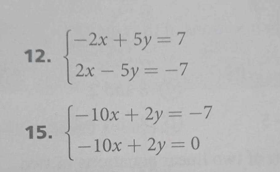12. \\begin{cases} -2x + 5y = 7 \\\\ 2x - 5y = -7 \\end{cases} 15. \\be…