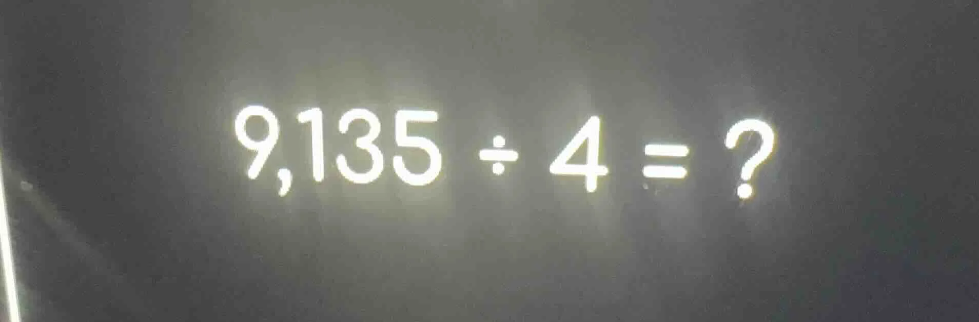 9,135 ÷ 4 = ?